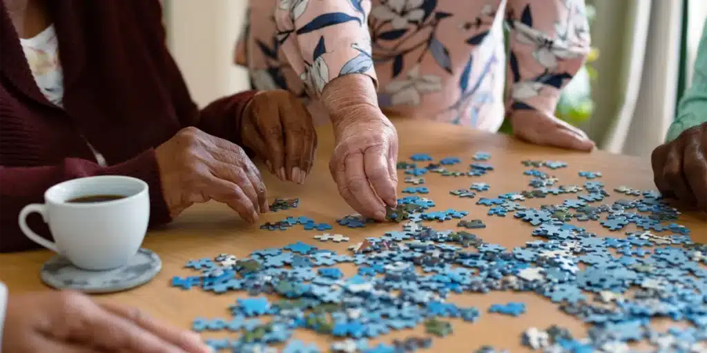 Seniors playing puzzle